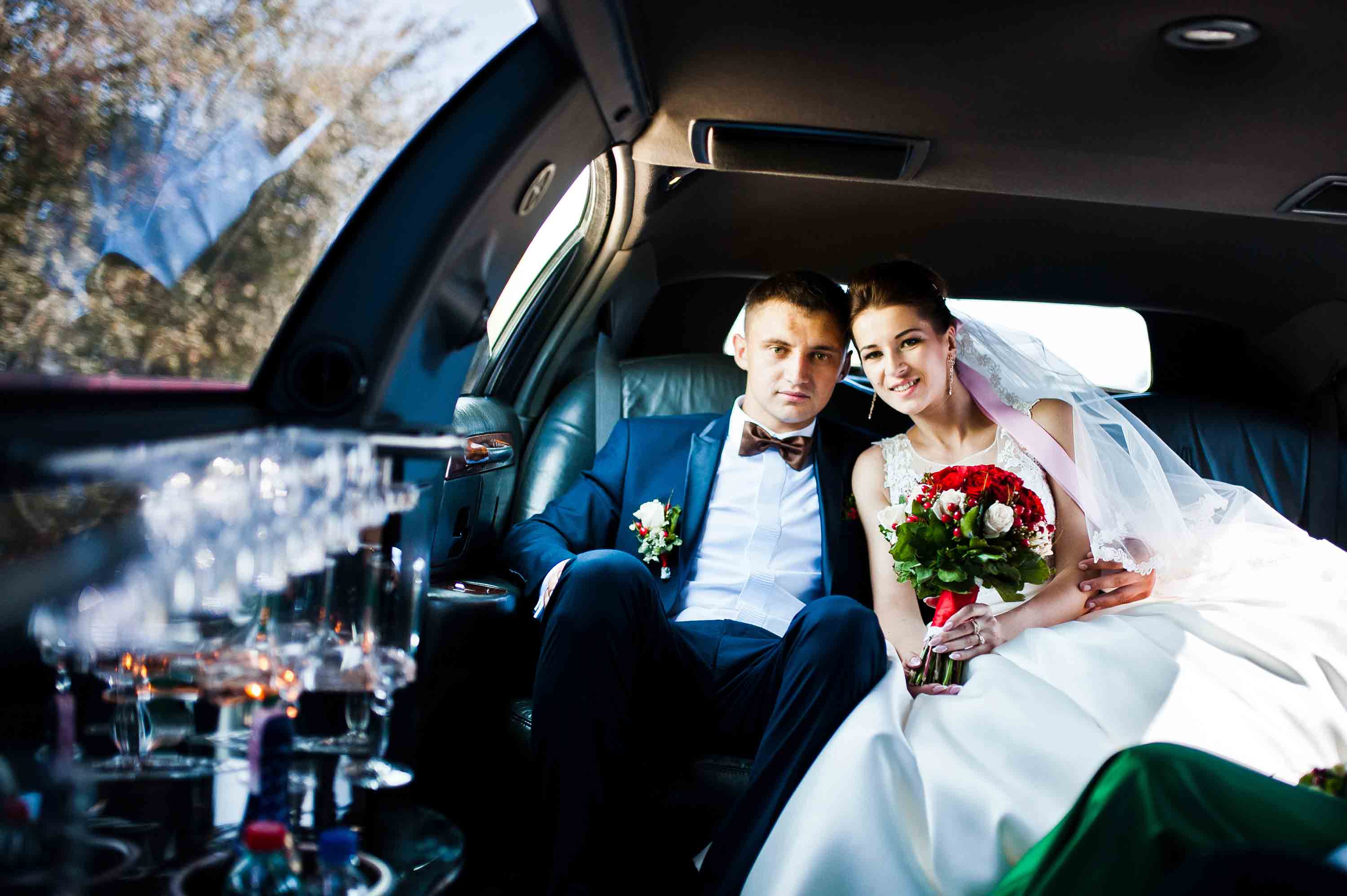 man and women enjoying Portland Oregon wedding limo services
